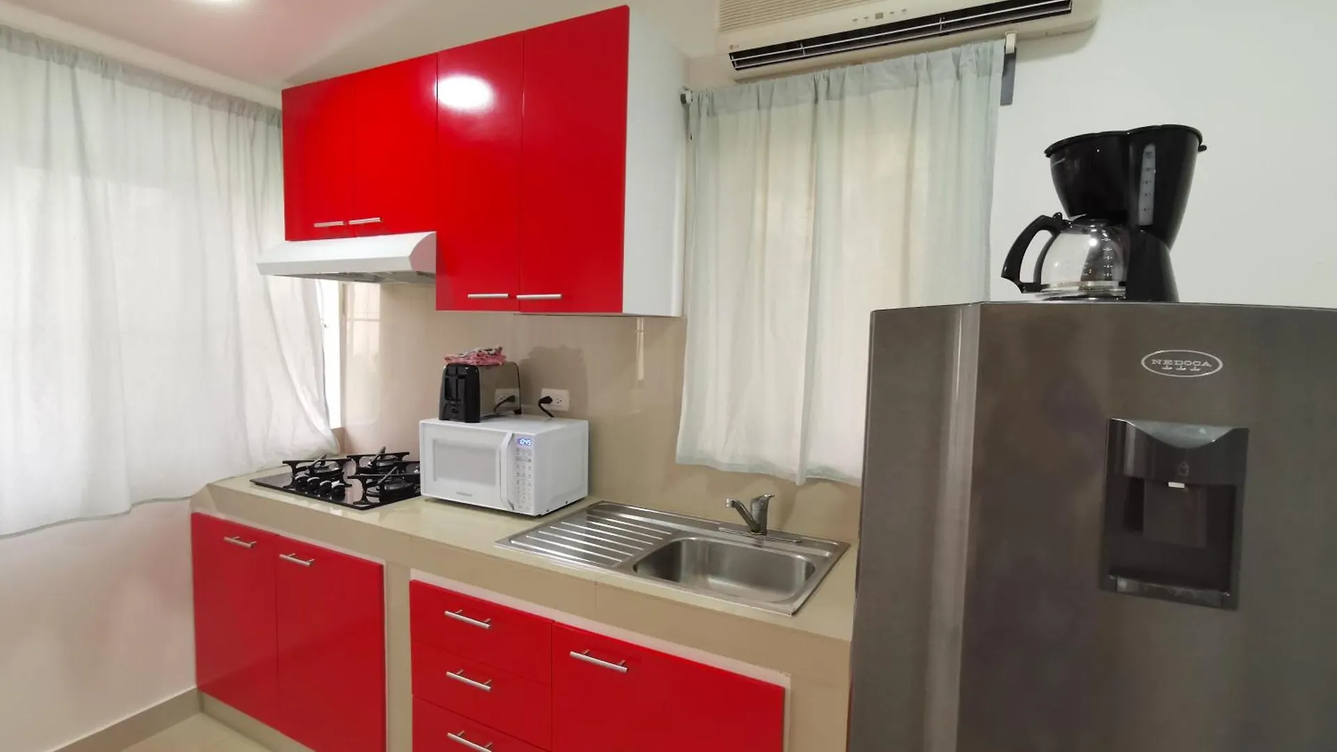 Hotel Caribbean Oasis - Villas And Apartments - Playa Los Corales Punta Cana